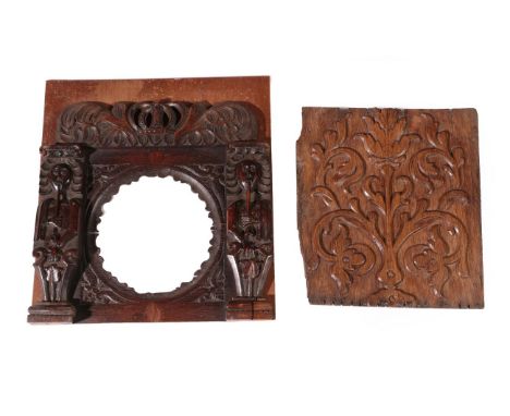 A 17th Century Carved Oak Panel, mounted on a later board, the crown cresting with two caryatid mounts around a circular carv