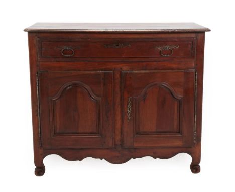 An Early 18th Century French Provincial Fruitwood and Pine-Lined Cupboard, the long frieze drawer with iron loop handles and 