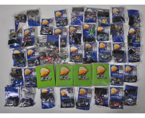 A large collection of assorted Hachette / Maisto ' Mega Bikes ' 1/18 scale diecast model motorbikes / motorcycles with accomp