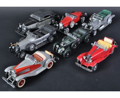 A collection of x7 assorted Franklin Mint and Danbury Mint 1/24 scale diecast model cars to include; 1939 Maybach Zeppelin, 1