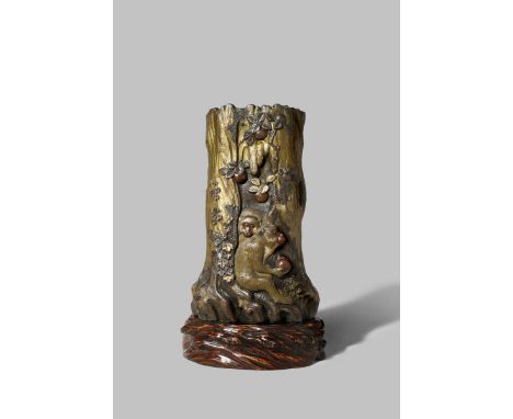 A JAPANESE MIXED METAL VASE MEIJI 1868-1912 Depicting three monkeys against a hollowed tree trunk, with vines and fruits grow