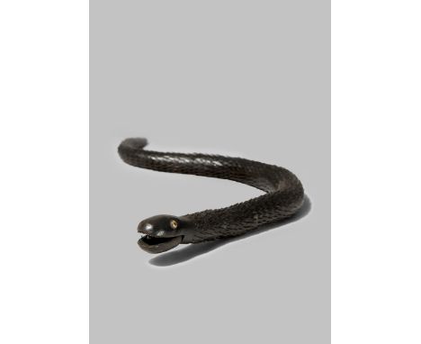 A JAPANESE IRON ARTICULATED MODEL OF A SNAKE, KUSSHIN JIZAI OKIMONO 19TH/20TH CENTURY Realistically modelled, constructed of 