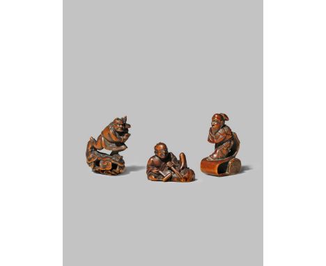 THREE JAPANESE WOOD NETSUKE MEIJI 1868-1912 One depicting Tentoki or Raiden standing on a cloud and holding a lantern, anothe