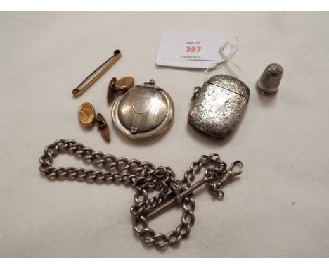 A Chester 1890 silver Vesta case with engraved decoration, silver compact, Albert chain and cufflinks