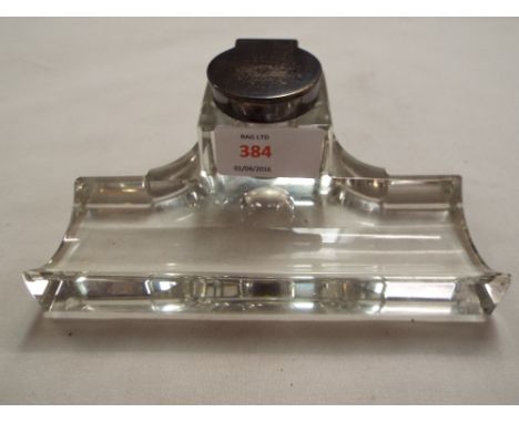 A stylish cut glass and Birmingham silver top inkwell and pen rest 