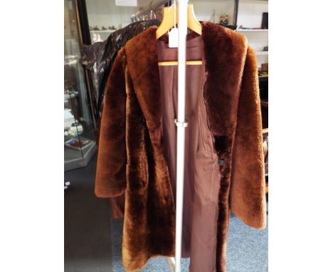 A vintage faux fur coat 