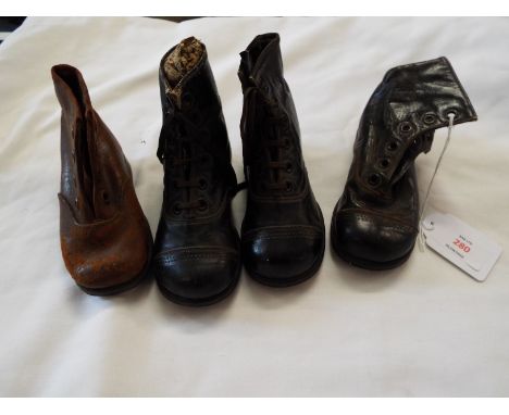 A pair of vintage childs black leather boots with laces size 4, a size 5 left leather boot a brown leather boot size 3 and a 