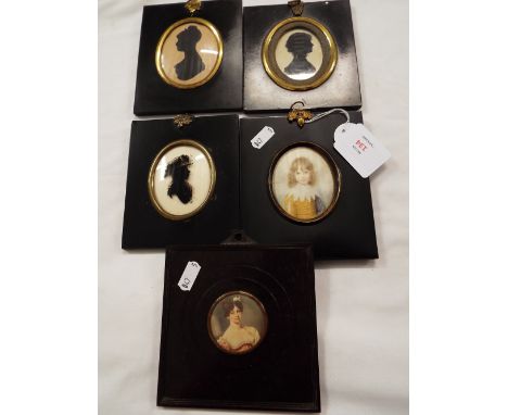 Two 19thC oval silhouettes depicting females, a Victorian reverse painting on glass together with a small print housed, each 