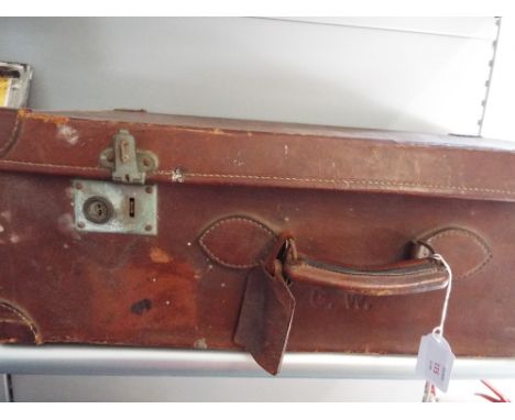 A vintage brown leather suitcase