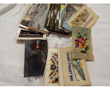 A mixed selection of vintage postcards and sweetheart cards