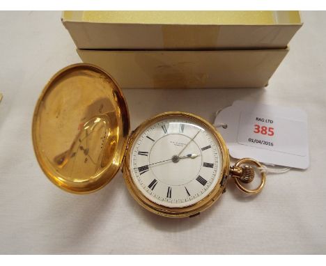 An Edwardian 18 carat gold full-hunter pocket watch/stop watch with white enamel dial and Roman numerals inscribed M.J. Russe