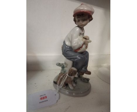 A Lladro figurine 'My Best Friend' boy with puppy, marks to base No 5401  In good condition 