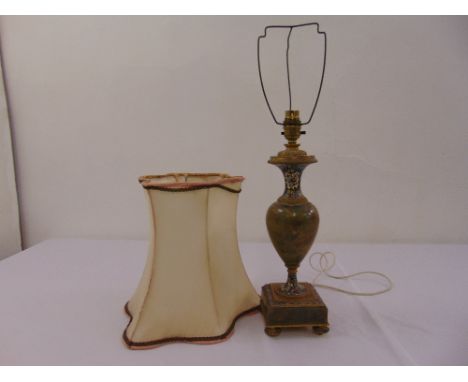 An onyx and champlevé table lamp of baluster form on raised square base with silk shade