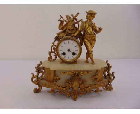 A French gilt metal and marble mantle clock, to include pendulum A/F