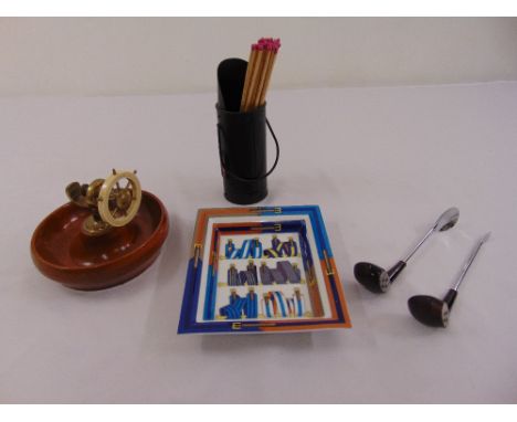 A Hermes porcelain dish, a nut cracker in a nautical style, a match striker in the form of a coal scuttle and two bar tools i