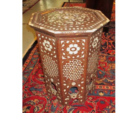 MOORISH TABLE, Moorish hardwood and mother of pearl and bone inlaid, octagonal with arcaded base, 38cm diam x 50cm H. 