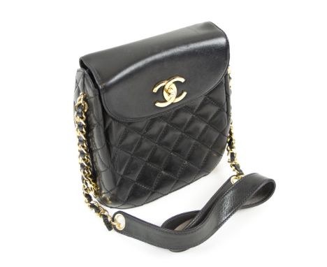CHANEL VINTAGE CROSSBODY BAG, with chain and leather strap, foldover top with twist lock closure, partially quilted, iconic b