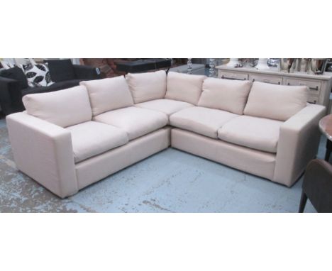 CORNER SOFA, in three sections with beige upholstery, 257cm x 259cm. (with faults)