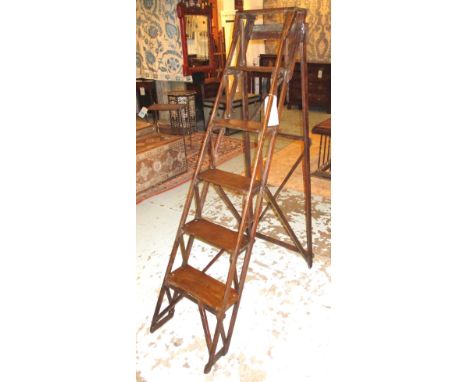 LIBRARY STEPS, early 20th century vintage six tread and lattice work metal, stamped 'Hatherley Patent', 152cm H x 51cm W x 10