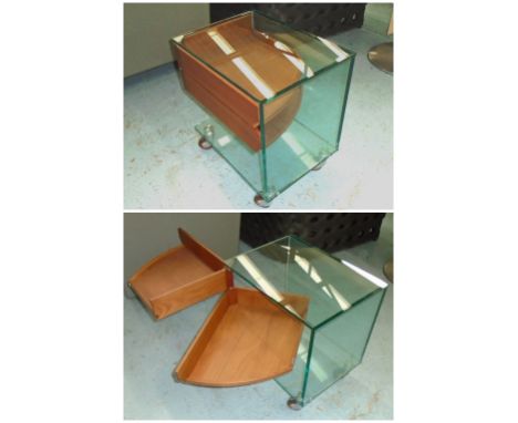 OCCASIONAL TABLE, with glass top above two drawers and shelf below, on castors, 49cm x 36cm x 54cm H.