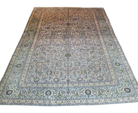 VERY FINE KASHAN CARPET, 380cm x 275cm, all over design of palmettes and scrolling vines on an antique jade field inside corr