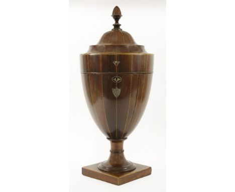 A George III inlaid mahogany knife box,of urn shape, with feather strung details and an acorn finial, the top opening to reve