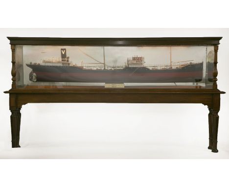 A mahogany cased half ship model 'Mobiloil',with a mirror back, cracked, labelled 'Mobiloil', with label reading: 'Built by t