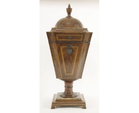 A George III mahogany boxwood and chequer inlaid knife box,of tapering square section with a dome top and a turned finial, th