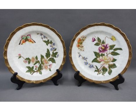 Pair of Royal Worcester porcelain cabinet plates with butterfly and flowers pattern, with puce backstamps, 23cm diameter (2) 