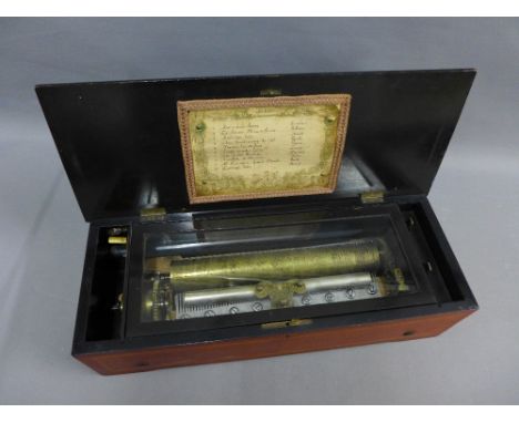 Swiss cylinder music box, playing ten airs, in a rosewood and marquetry  inlaid case, 57 x 23 x 16cm 