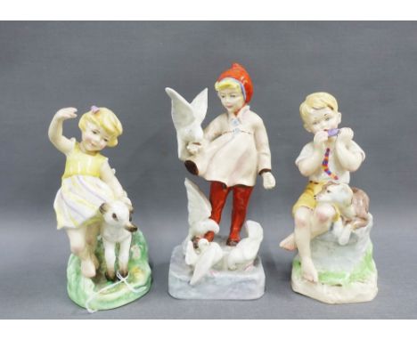 A collection of Royal Worcester figures, modelled by F.G Doughty, to include April, June and November, tallest 19cm (3) 