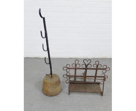 Wrought iron candlestick and a rack, tallest 86cm (2) 