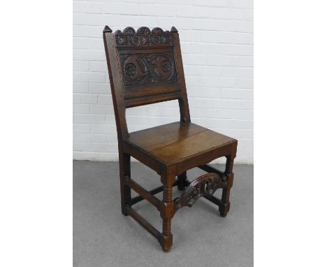 Dark oak Wainscott style chair with carved back, solid seat and bobbin front legs, 98 x 47cm