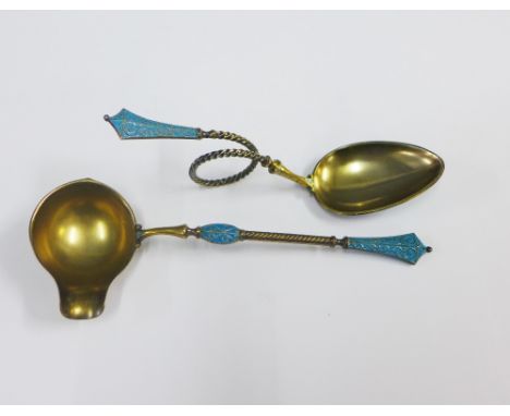 Norwegian style silver gilt and enamel spoon with a  looped stem together with a matching ladle, both stamped 925, 15cm long 