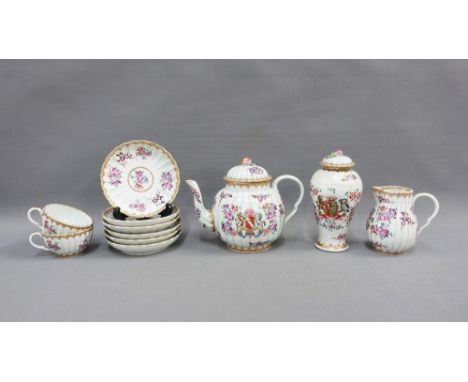 Samson armorial pattern part teaset comprising a teapot with a flower finial, two cups, six saucers, sparrow beak jug and a V