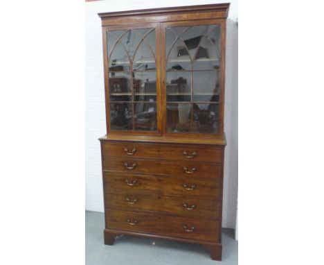 George III mahogany and string inlaid secretaire bookcase of large proportions, with a cornice top above a pair of astrgal gl