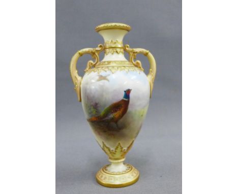 Royal Worcester porcelain two handled vase, handpainted with a pheasant , within gilt acanthus moulded borders, unsigned, dat