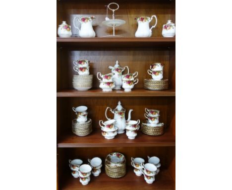 An extensive Royal Albert Old Country Roses teaset comprising  cups, saucers, side plates, two tier cake plate, sugar bowls, 