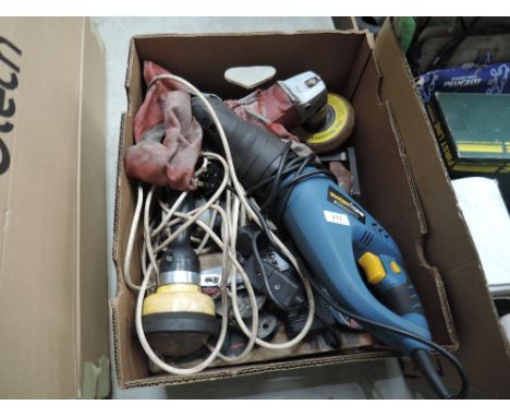 A selection of power tools including recprocating saw 