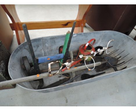 A selection of gardening and similar tools