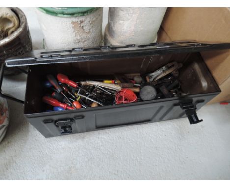 A selection of various tools and chest
