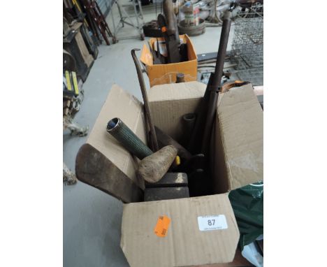 A selection of tools including black smiths hammer