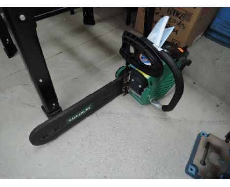 A petrol motor chainsaw