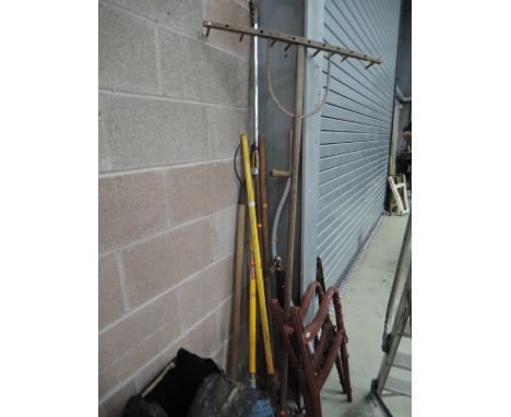 A selection of gardeners rakes and fork etc 