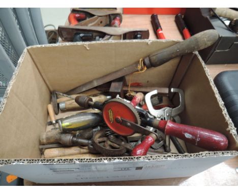 A selection of woodworking tools including chizels