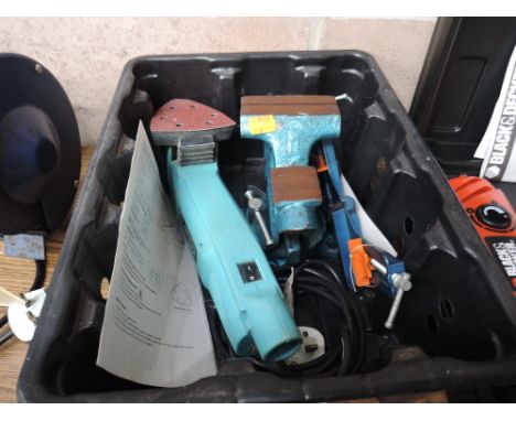 A selection of clamps and sander