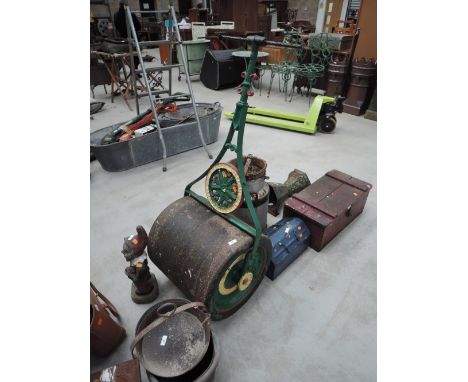 An early cast twin drum garden roller