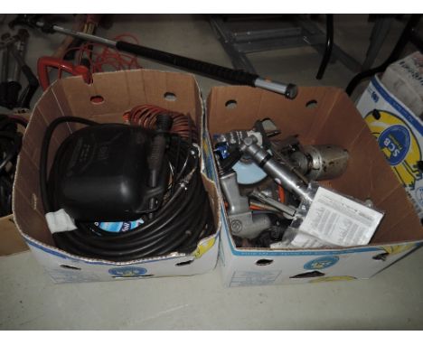 A selection of air hoses and compresser tools including ratchet, spray gun and drill 