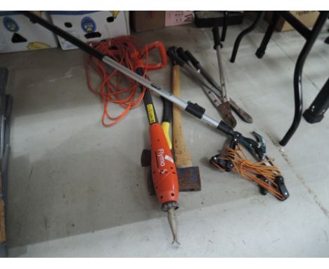 A selection of gardening tools including Flymo 