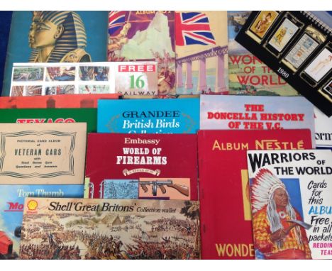 Cigarette & Trade card albums, a quantity of unused and part-complete albums including Esso World Cup Coin Collection 1970, D